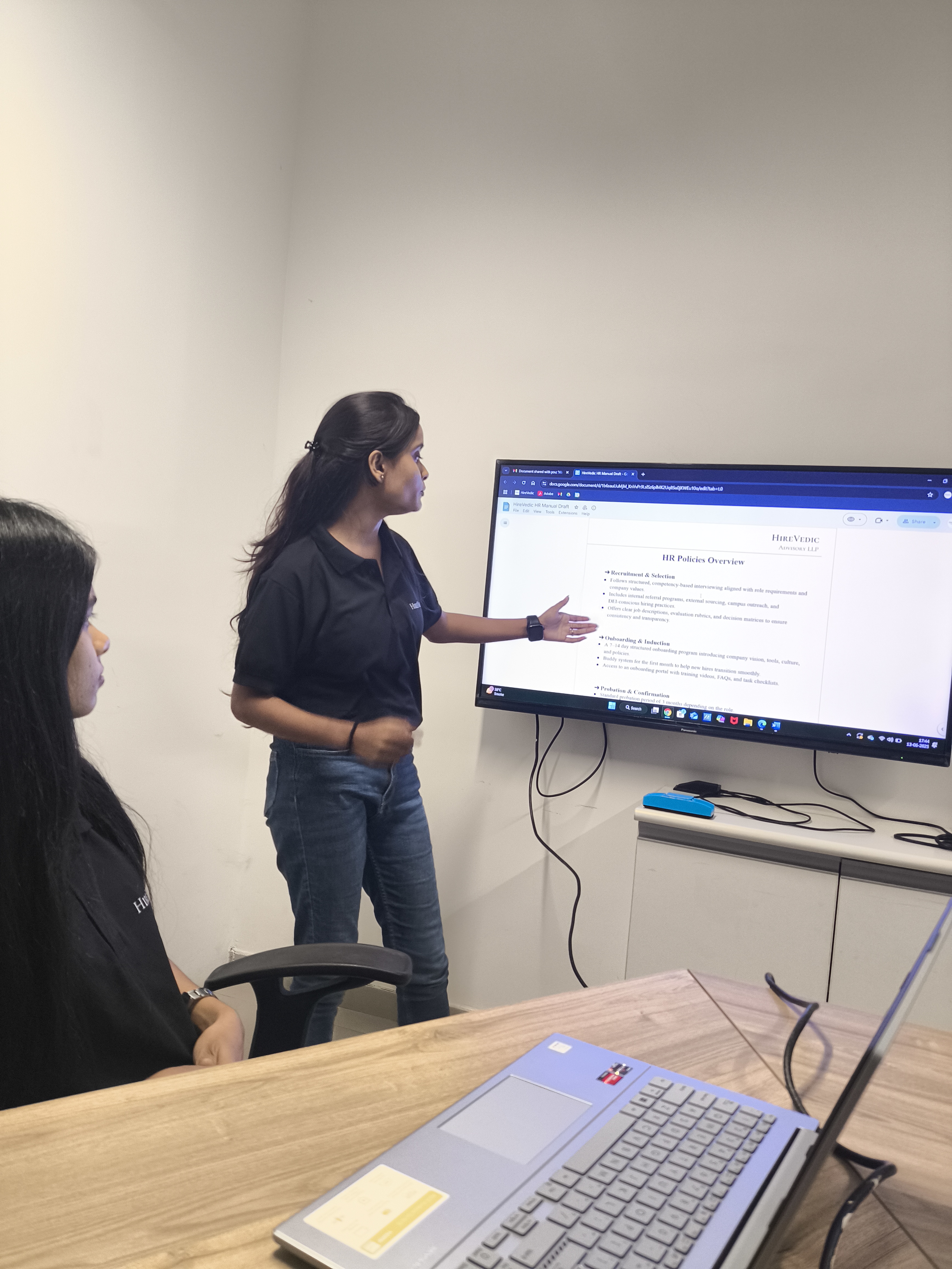 HireVedic team reviewing HR policy framework